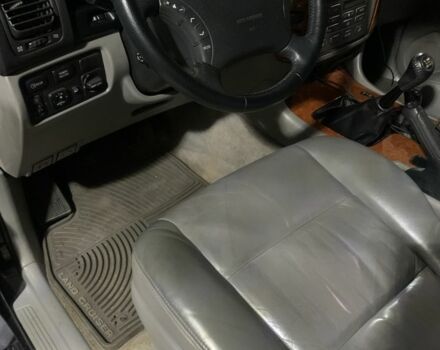 Черный Тойота Ленд Крузер 100, объемом двигателя 4.2 л и пробегом 260 тыс. км за 30000 $, фото 1 на Automoto.ua