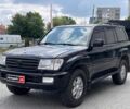 Чорний Тойота Ленд Крузер 100, об'ємом двигуна 4.5 л та пробігом 400 тис. км за 12990 $, фото 1 на Automoto.ua