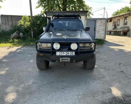 Чорний Тойота Ленд Крузер 100, об'ємом двигуна 4 л та пробігом 300 тис. км за 9500 $, фото 1 на Automoto.ua