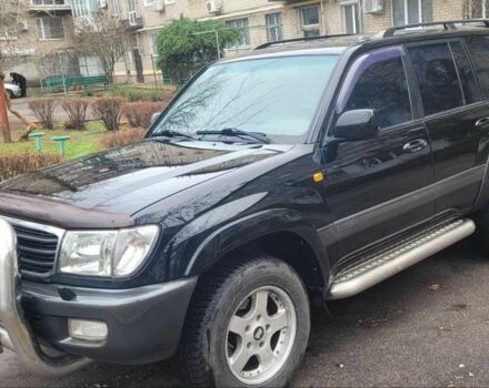 Чорний Тойота Ленд Крузер 100, об'ємом двигуна 4.7 л та пробігом 385 тис. км за 11500 $, фото 1 на Automoto.ua