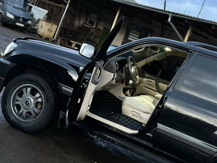 Тойота Ленд Крузер 100 2003 у Рівному на Automoto.ua Чорний Тойота Ленд Крузер 100, об'ємом двигуна 4.7 л та пробігом 400 тис. км за 18500 $, фото 1 на Automoto.ua