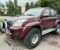 Красный Тойота Ленд Крузер 100, объемом двигателя 3 л и пробегом 240 тыс. км за 3121 $, фото 1 на Automoto.ua