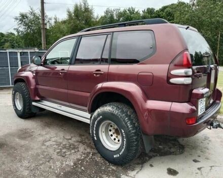 Красный Тойота Ленд Крузер 100, объемом двигателя 3 л и пробегом 240 тыс. км за 3121 $, фото 2 на Automoto.ua