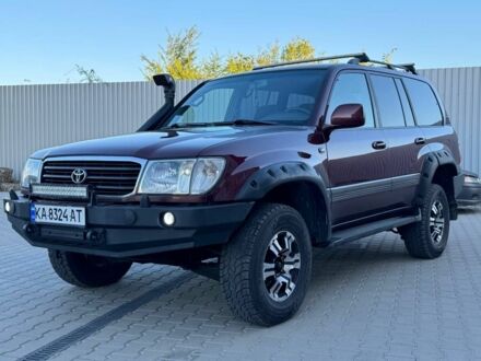 Червоний Тойота Ленд Крузер 100, об'ємом двигуна 4.7 л та пробігом 320 тис. км за 9500 $, фото 1 на Automoto.ua