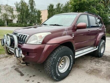 Красный Тойота Ленд Крузер 100, объемом двигателя 3 л и пробегом 240 тыс. км за 3121 $, фото 1 на Automoto.ua