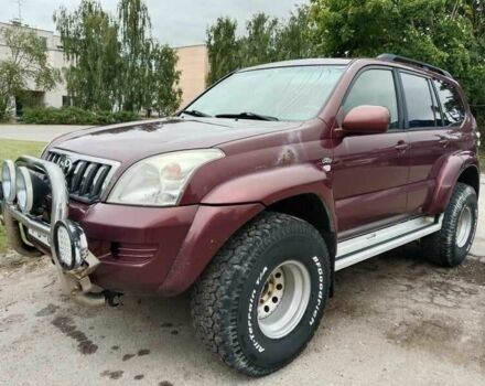 Красный Тойота Ленд Крузер 100, объемом двигателя 3 л и пробегом 240 тыс. км за 3121 $, фото 1 на Automoto.ua