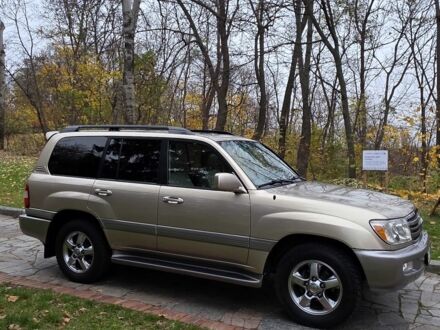 Желтый Тойота Ленд Крузер 100, объемом двигателя 4.7 л и пробегом 99 тыс. км за 35000 $, фото 1 на Automoto.ua