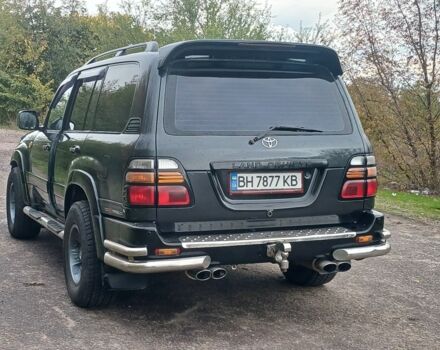 Серый Тойота Ленд Крузер 100, объемом двигателя 4 л и пробегом 459 тыс. км за 12300 $, фото 3 на Automoto.ua
