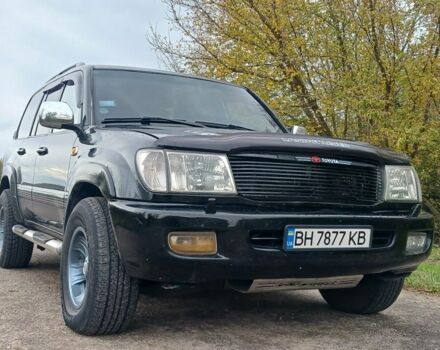 Серый Тойота Ленд Крузер 100, объемом двигателя 4 л и пробегом 459 тыс. км за 12300 $, фото 4 на Automoto.ua