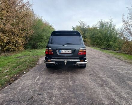 Серый Тойота Ленд Крузер 100, объемом двигателя 4 л и пробегом 459 тыс. км за 12300 $, фото 5 на Automoto.ua