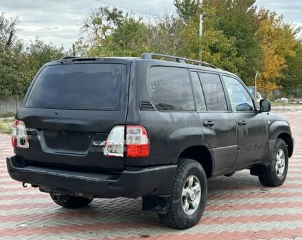 Серый Тойота Ленд Крузер 100, объемом двигателя 4.7 л и пробегом 300 тыс. км за 5950 $, фото 4 на Automoto.ua