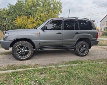 Серый Тойота Ленд Крузер 100, объемом двигателя 4.2 л и пробегом 453 тыс. км за 16500 $, фото 6 на Automoto.ua