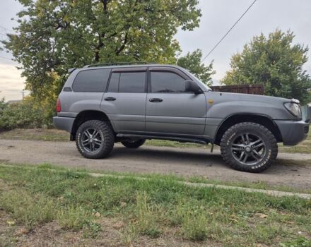 Серый Тойота Ленд Крузер 100, объемом двигателя 4.2 л и пробегом 453 тыс. км за 16500 $, фото 3 на Automoto.ua