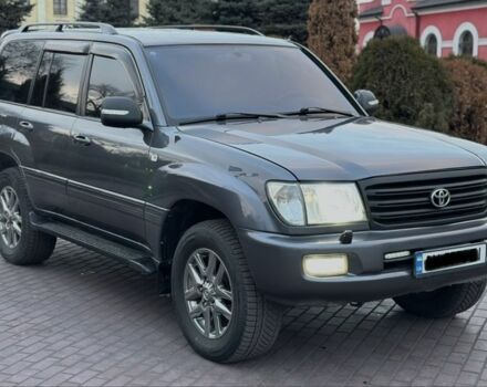 Серый Тойота Ленд Крузер 100, объемом двигателя 4.7 л и пробегом 440 тыс. км за 12500 $, фото 2 на Automoto.ua