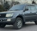 Серый Тойота Ленд Крузер 100, объемом двигателя 4.7 л и пробегом 440 тыс. км за 12500 $, фото 1 на Automoto.ua