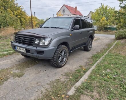 Серый Тойота Ленд Крузер 100, объемом двигателя 4.2 л и пробегом 453 тыс. км за 16500 $, фото 1 на Automoto.ua