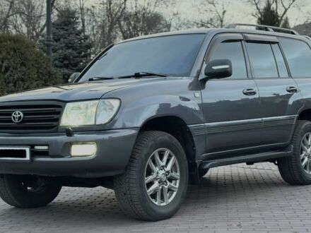 Серый Тойота Ленд Крузер 100, объемом двигателя 4.7 л и пробегом 440 тыс. км за 12500 $, фото 1 на Automoto.ua