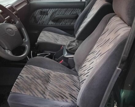 Зеленый Тойота Ленд Крузер 100, объемом двигателя 3 л и пробегом 440 тыс. км за 6000 $, фото 5 на Automoto.ua