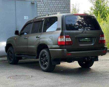 Зелений Тойота Ленд Крузер 100, об'ємом двигуна 4.2 л та пробігом 618 тис. км за 14490 $, фото 4 на Automoto.ua