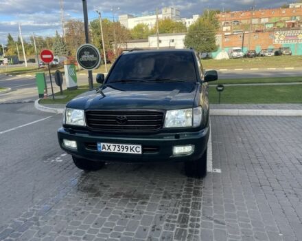 Зелений Тойота Ленд Крузер 100, об'ємом двигуна 4.7 л та пробігом 300 тис. км за 12000 $, фото 1 на Automoto.ua