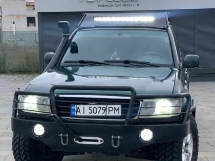 Зеленый Тойота Ленд Крузер 100, объемом двигателя 4.2 л и пробегом 460 тыс. км за 13999 $, фото 1 на Automoto.ua