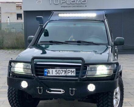 Зеленый Тойота Ленд Крузер 100, объемом двигателя 4.2 л и пробегом 460 тыс. км за 13999 $, фото 1 на Automoto.ua