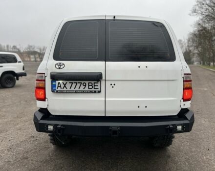 Серый Тойота Ленд Крузер 105, объемом двигателя 4.5 л и пробегом 210 тыс. км за 23000 $, фото 6 на Automoto.ua