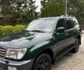Зеленый Тойота Ленд Крузер 105, объемом двигателя 4.2 л и пробегом 265 тыс. км за 3300 $, фото 1 на Automoto.ua