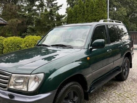 Зеленый Тойота Ленд Крузер 105, объемом двигателя 4.2 л и пробегом 265 тыс. км за 3300 $, фото 1 на Automoto.ua