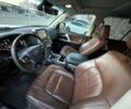 Білий Тойота Ленд Крузер 200, об'ємом двигуна 4.5 л та пробігом 285 тис. км за 39999 $, фото 16 на Automoto.ua