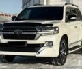 Білий Тойота Ленд Крузер 200, об'ємом двигуна 4.5 л та пробігом 100 тис. км за 10000 $, фото 1 на Automoto.ua