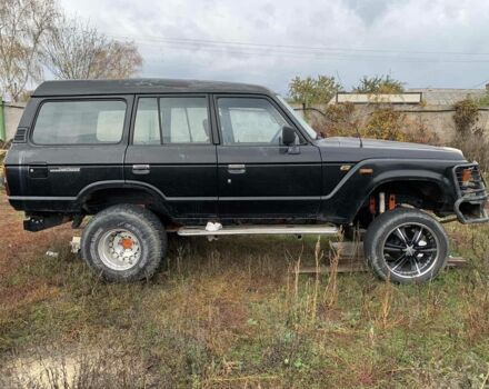 Черный Тойота Ленд Крузер 60, объемом двигателя 0 л и пробегом 100 тыс. км за 3999 $, фото 1 на Automoto.ua