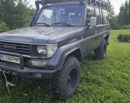 Синий Тойота Ленд Крузер 70, объемом двигателя 3 л и пробегом 205 тыс. км за 16000 $, фото 3 на Automoto.ua