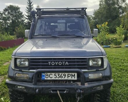 Синий Тойота Ленд Крузер 70, объемом двигателя 3 л и пробегом 205 тыс. км за 16000 $, фото 2 на Automoto.ua