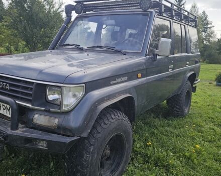 Синий Тойота Ленд Крузер 70, объемом двигателя 3 л и пробегом 205 тыс. км за 16000 $, фото 1 на Automoto.ua