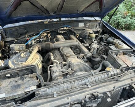 Синий Тойота Ленд Крузер 80, объемом двигателя 4.2 л и пробегом 430 тыс. км за 12000 $, фото 11 на Automoto.ua