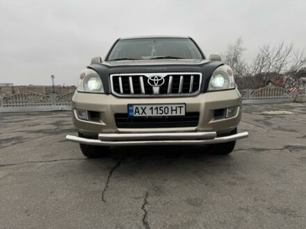 Бежевый Тойота Ленд Крузер Прадо 120, объемом двигателя 3 л и пробегом 200 тыс. км за 18700 $, фото 1 на Automoto.ua