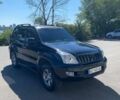Чорний Тойота Ленд Крузер Прадо 120, об'ємом двигуна 4 л та пробігом 361 тис. км за 16500 $, фото 1 на Automoto.ua