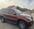 Червоний Тойота Ленд Крузер Прадо 120, об'ємом двигуна 4 л та пробігом 280 тис. км за 16500 $, фото 1 на Automoto.ua