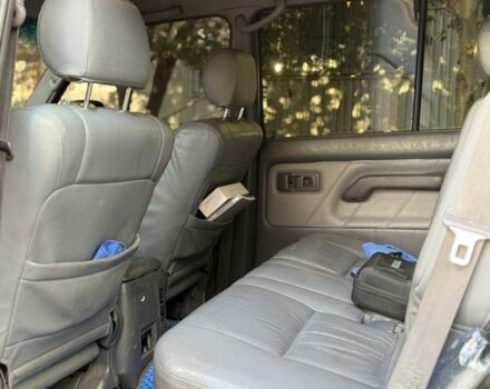 Фиолетовый Тойота Ленд Крузер Прадо 90, объемом двигателя 3 л и пробегом 397 тыс. км за 7000 $, фото 4 на Automoto.ua