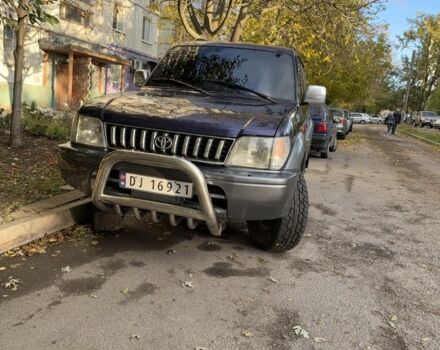 Фиолетовый Тойота Ленд Крузер Прадо 90, объемом двигателя 3 л и пробегом 397 тыс. км за 7000 $, фото 1 на Automoto.ua