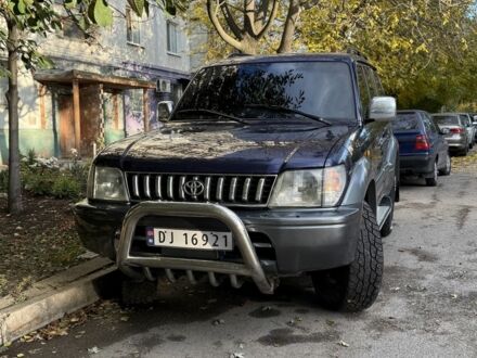 Фиолетовый Тойота Ленд Крузер Прадо 90, объемом двигателя 3 л и пробегом 397 тыс. км за 7000 $, фото 1 на Automoto.ua