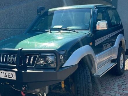 Зеленый Тойота Ленд Крузер Прадо 90, объемом двигателя 3.4 л и пробегом 340 тыс. км за 10000 $, фото 1 на Automoto.ua