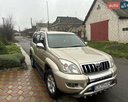Бежевий Тойота Ленд Крузер Прадо, об'ємом двигуна 4 л та пробігом 322 тис. км за 11700 $, фото 1 на Automoto.ua
