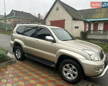 Бежевий Тойота Ленд Крузер Прадо, об'ємом двигуна 4 л та пробігом 322 тис. км за 11700 $, фото 1 на Automoto.ua