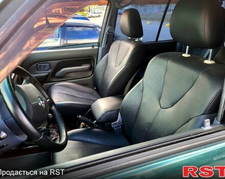 Зеленый Тойота Ленд Крузер Прадо, объемом двигателя 3.4 л и пробегом 380 тыс. км за 8700 $, фото 5 на Automoto.ua