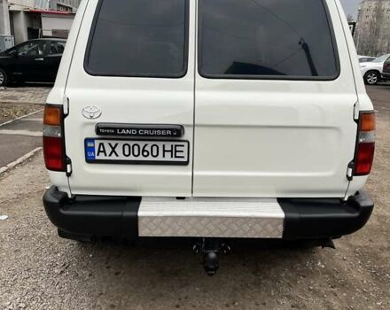 Белый Тойота Ленд Крузер, объемом двигателя 4.47 л и пробегом 321 тыс. км за 17000 $, фото 1 на Automoto.ua