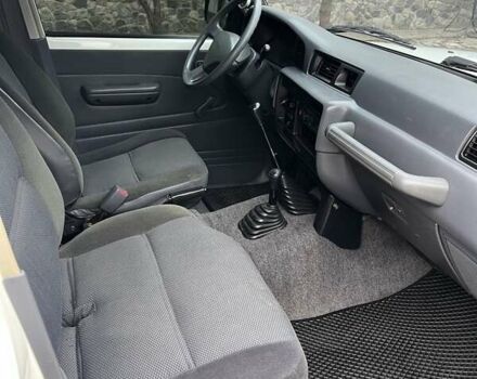 Белый Тойота Ленд Крузер, объемом двигателя 4.47 л и пробегом 321 тыс. км за 17000 $, фото 2 на Automoto.ua