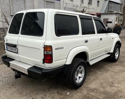 Белый Тойота Ленд Крузер, объемом двигателя 4.47 л и пробегом 321 тыс. км за 17000 $, фото 13 на Automoto.ua
