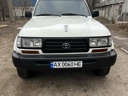 Белый Тойота Ленд Крузер, объемом двигателя 4.47 л и пробегом 321 тыс. км за 17000 $, фото 1 на Automoto.ua